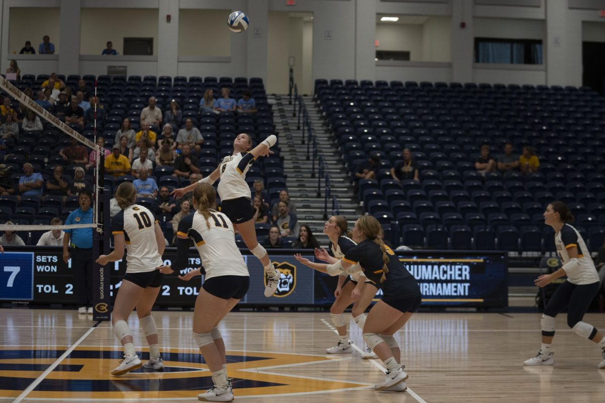 UW- Eau Claire’s Bailey Leeke jumps at the net before a kill opportunity.