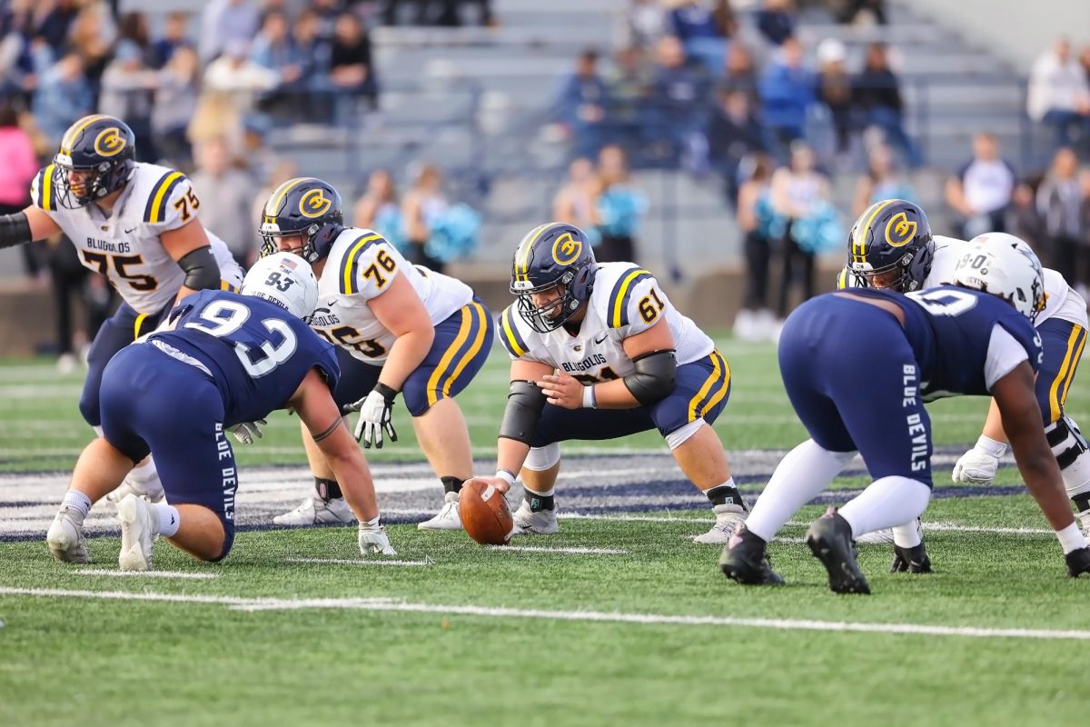 Center Lucas Barby preparing to snap the ball in game vs UW-Stout on Oct 26.