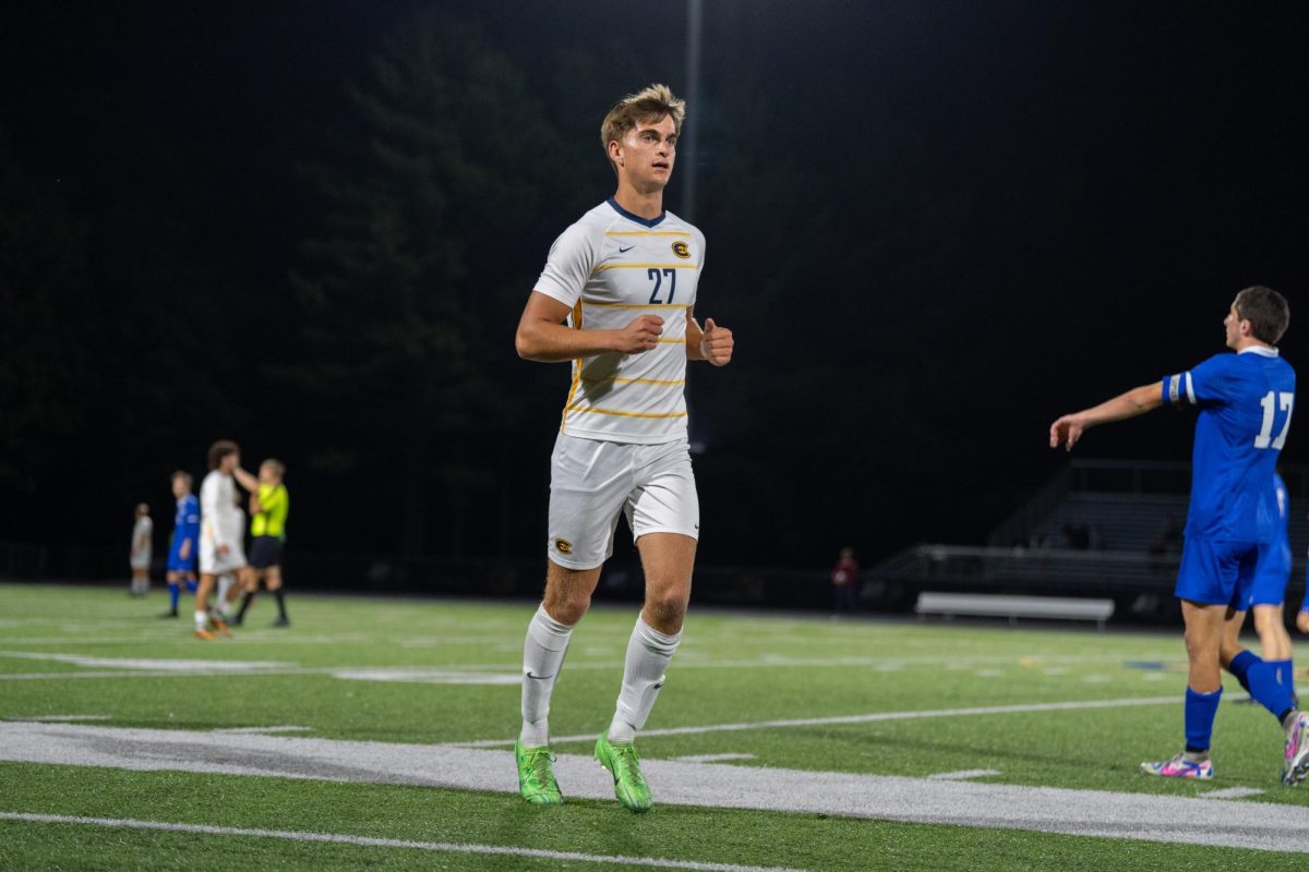 Forward Will Miers jogging during a stop of play in Friday’s match against UW-Platteville. 