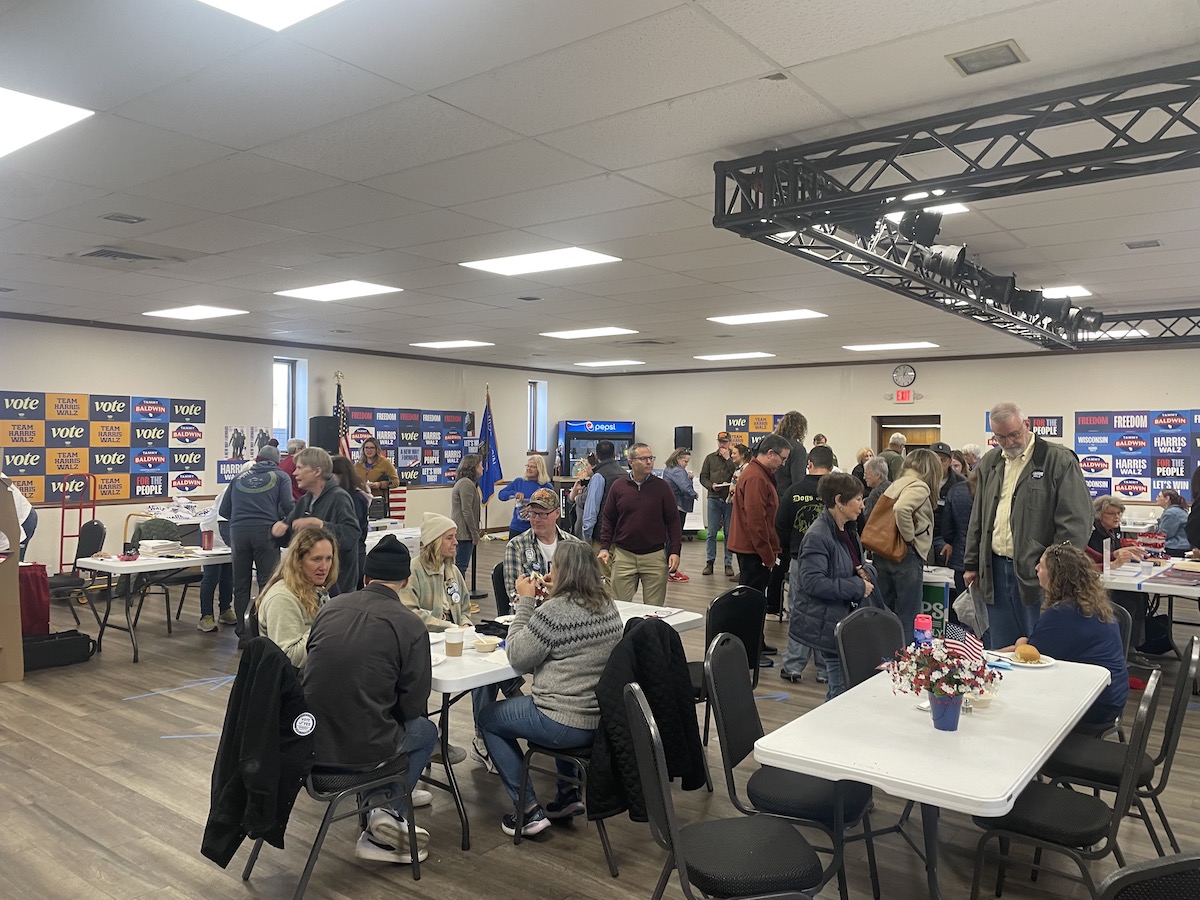 Community members gather at Brickhouse in support of Democratic candidates.