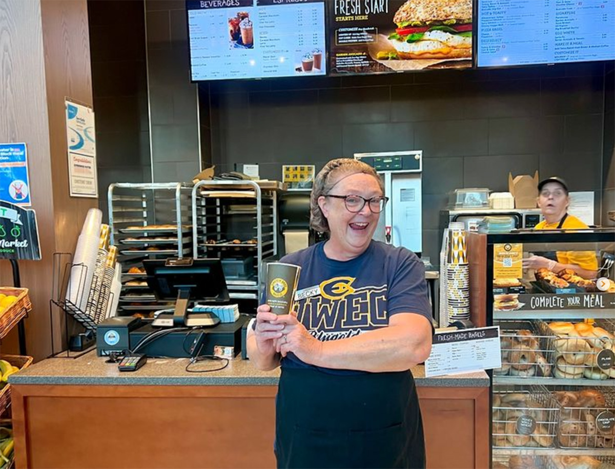 Jenson poses in front of Einstein’s on one of her last days (Photo used with permission from UWEC Dining).