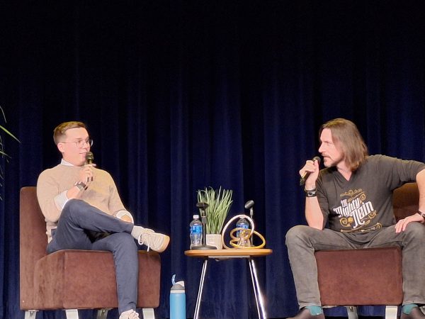 Voice actor and dungeon master Matthew Mercer (right) sits down for the interview.