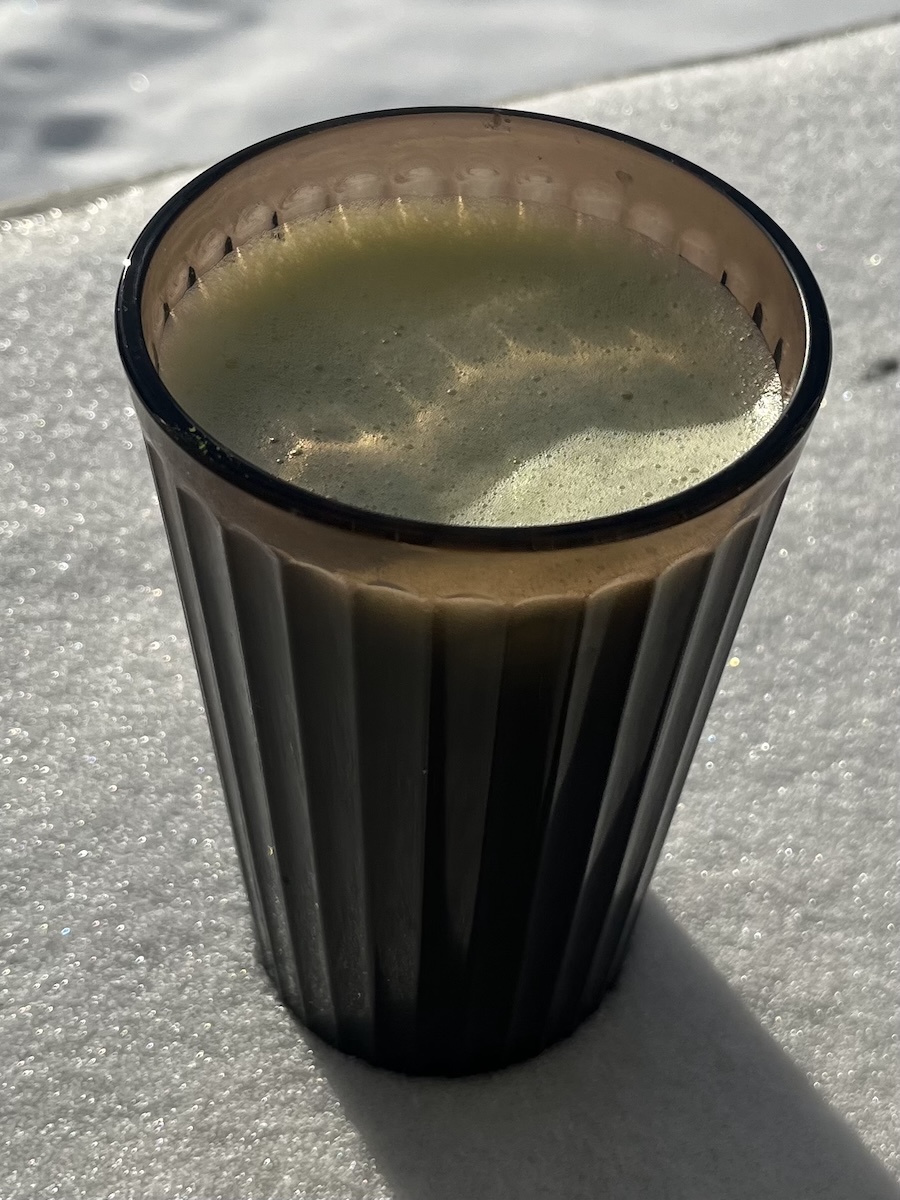 My go-to iced lavender matcha latte sitting atop a fresh layer of snow.
